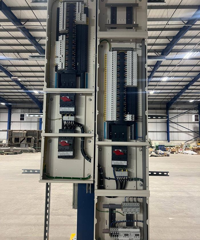 Distribution boards on a frame in a warehouse